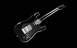 Гитара на чёрном фоне